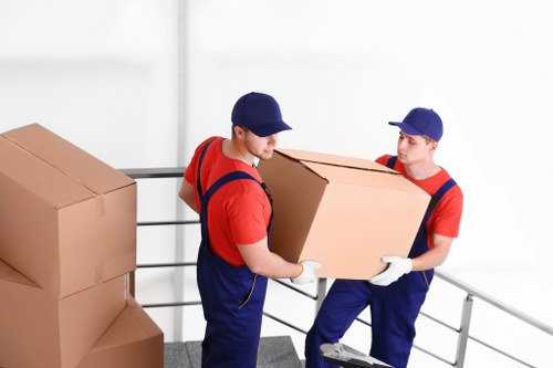 Moving truck and packed boxes for local removals in Hayes