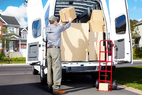 Packed office supplies and relocation checklist for office removals in Hayes