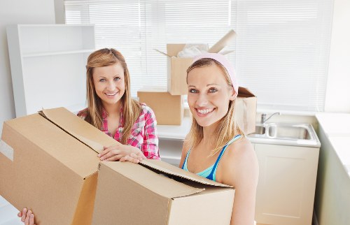 Packed boxes and furniture ready for removal in Hayes