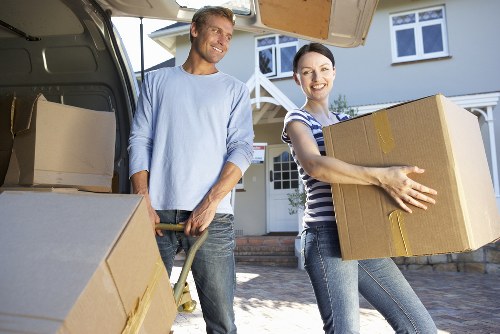 Local Hayes moving team handling furniture carefully